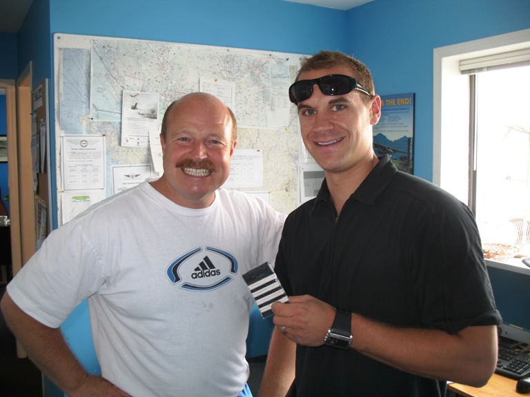 Look at those Captain's Stripes.  Langley Flying School Graduate and Former Flight Instructor, Ryan Gahan, shows Chief Flying Instructor Dave Parry his fresh markers.  Ryan just got promoted from a Saab 340 First Officer to Beech 1900 with Pacific Coastal Airlines.  Ryan is one of three Langley Flying School Graduates currently flying with Pasco.